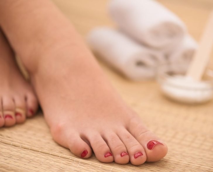 closeup-photo-female-feet-spa-salon-pedicure-manicure-procedure_530697-3447